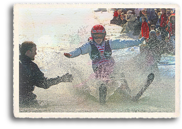 Pond skimming during spring break and spring skiing events at a Northern New Mexico ski resort